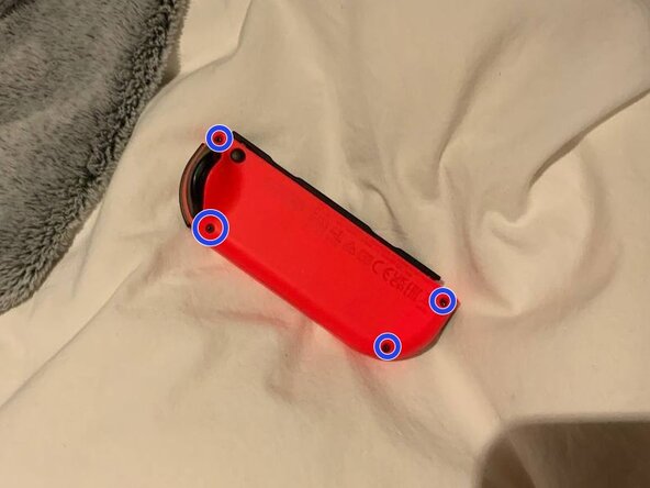 Joy-Con Motherboard Replacement, Unscrewing: paso 2, imagen 1 de 2