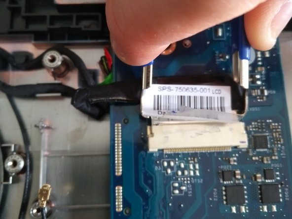 HP 250 G3 WiFi Card Replacement, removing LCD cable: crwdns2935265:017crwdnd2935265:02crwdnd2935265:03crwdne2935265:0