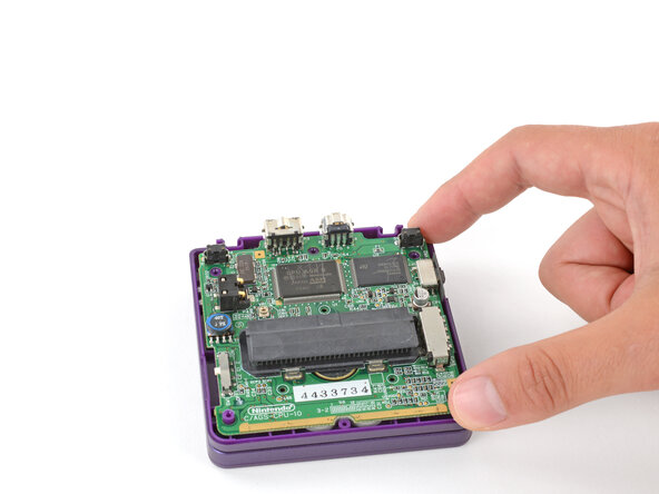 How to Reshell Your Game Boy Advance SP, Lay the motherboard down: crwdns2935265:058crwdnd2935265:02crwdnd2935265:02crwdne2935265:0