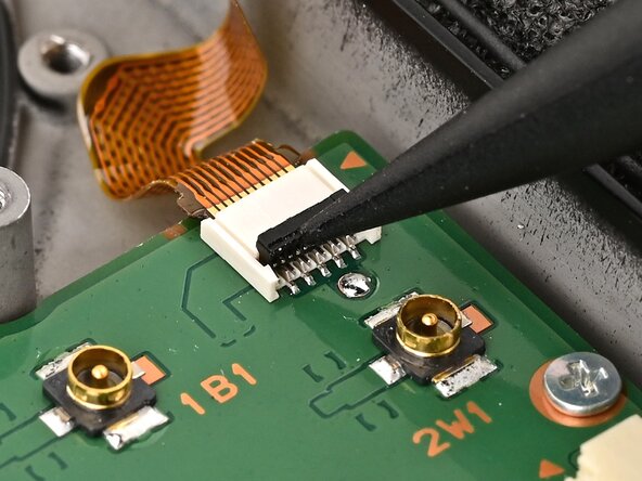 Nintendo Switch 2 Button Board Replacement, Disconnect the button board: crwdns2935265:035crwdnd2935265:02crwdnd2935265:02crwdne2935265:0