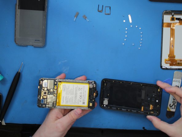 Alcatel Go Play (7048W) Teardown, Midframe detachment: crwdns2935265:011crwdnd2935265:03crwdnd2935265:03crwdne2935265:0