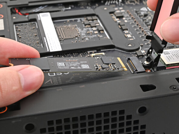 Framework Desktop Secondary Storage Replacement, Remove the SSD: crwdns2935265:010crwdnd2935265:02crwdnd2935265:02crwdne2935265:0