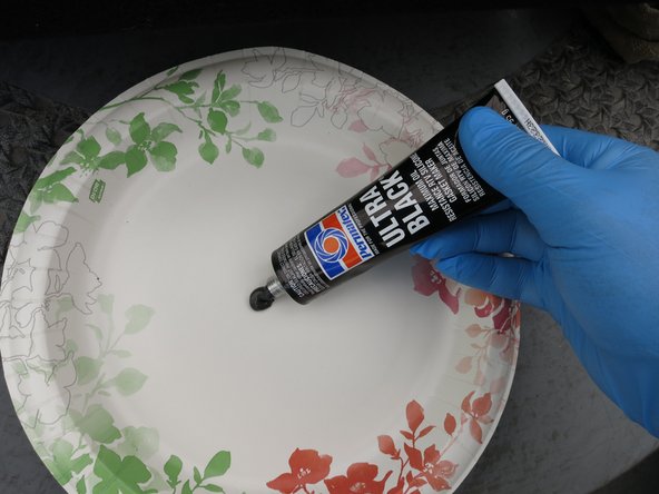 Put a dab of RTV silicone on a disposable plate, or some other clean, non-essential surface.