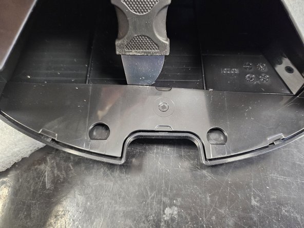 Roborock Q5 Pro: Laser Distance Sensor Replacement, Latches.: crwdns2935265:08crwdnd2935265:03crwdnd2935265:03crwdne2935265:0