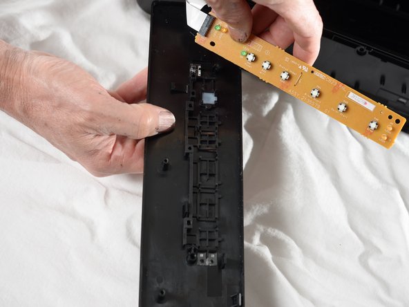 Epson Stylus NX230 Front Button Replacement: crwdns2935265:07crwdnd2935265:02crwdnd2935265:02crwdne2935265:0