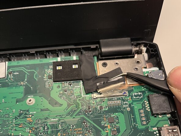 Asus M570D Mainboard tauschen, Display Kabel abstecken: Schritt 11, Bild 1 von 2