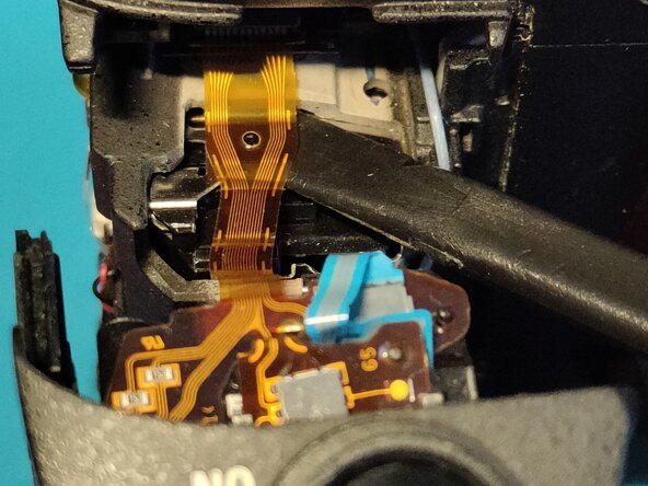 Sony A7 II Top Flex Cable replacement, Removing the grip 3: crwdns2935265:023crwdnd2935265:02crwdnd2935265:02crwdne2935265:0