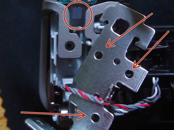 Desmontagem da câmera de vídeo Sony MV1, Remover a lente: crwdns2935265:05crwdnd2935265:02crwdnd2935265:03crwdne2935265:0