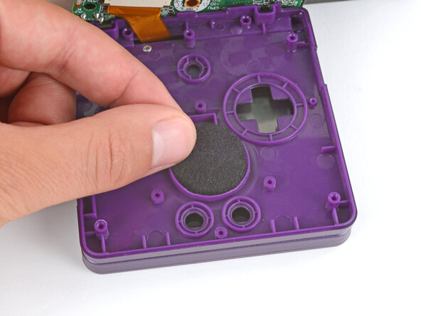 How to Reshell Your Game Boy Advance SP, Install the speaker: crwdns2935265:056crwdnd2935265:01crwdnd2935265:03crwdne2935265:0