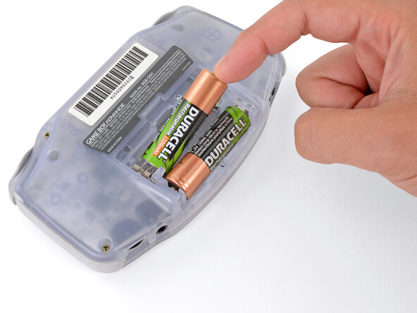 How to Reshell Your Game Boy Advance, Remove the batteries: crwdns2935265:03crwdnd2935265:01crwdnd2935265:03crwdne2935265:0