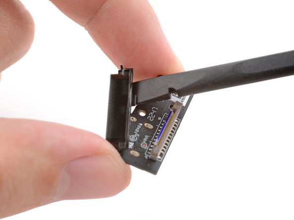 Polaroid I-2 USB-C Port Board Replacement, Remove the plastic cover: crwdns2935265:038crwdnd2935265:02crwdnd2935265:03crwdne2935265:0