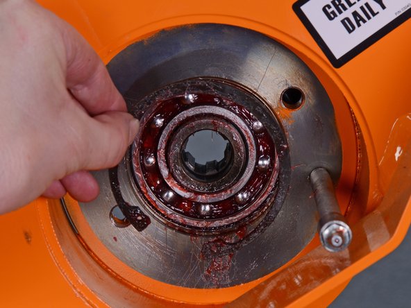 Barreto Tillers E1320HTRLR 2016 Tine Drive Motor Bearing Replacement, Remove the outer snap ring: crwdns2935265:022crwdnd2935265:03crwdnd2935265:03crwdne2935265:0