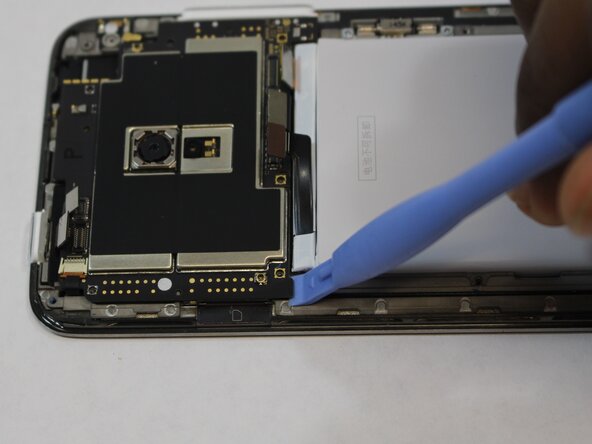 Meizu MX3 Motherboard Replacement, Removing Extra Components: crwdns2935265:04crwdnd2935265:03crwdnd2935265:03crwdne2935265:0