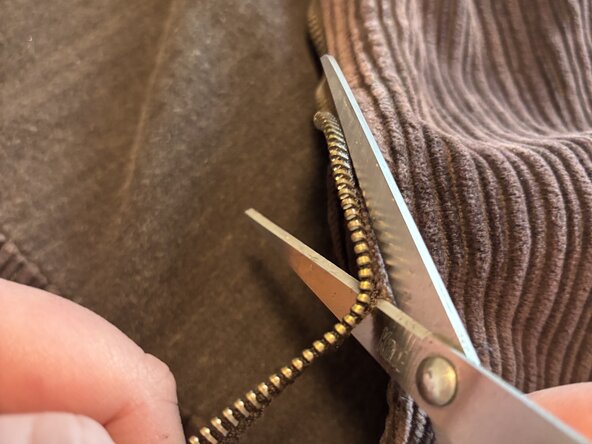 How to Flatten a Warped Jacket Zipper Track: step 3, image 1 of 2