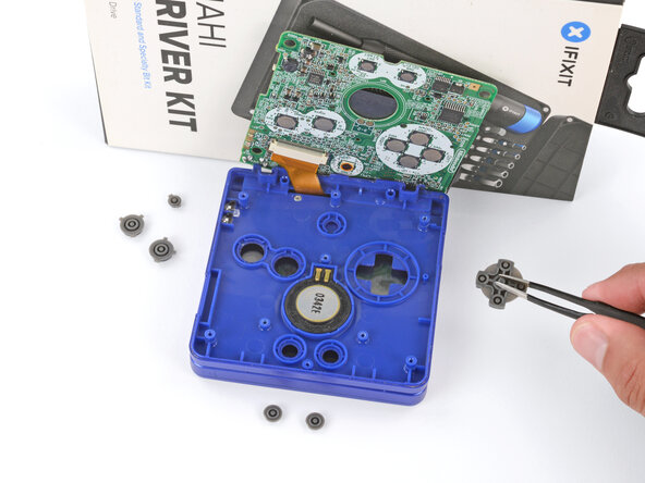 Nintendo Game Boy Advance SP Buttons Replacement, Remove the buttons: crwdns2935265:013crwdnd2935265:03crwdnd2935265:03crwdne2935265:0