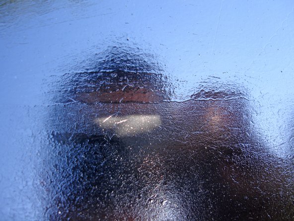 Smooth out any imperfections by wet sanding with water and 1500 grit sand paper.