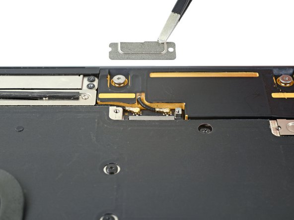 MacBook Air 2022 (M2) Left Speaker Replacement, Remove the speaker cable covers: crwdns2935265:012crwdnd2935265:03crwdnd2935265:03crwdne2935265:0