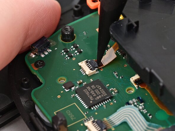 Joy-Con 2 (Right) Joystick Replacement, Disconnect the midframe: crwdns2935265:019crwdnd2935265:01crwdnd2935265:03crwdne2935265:0