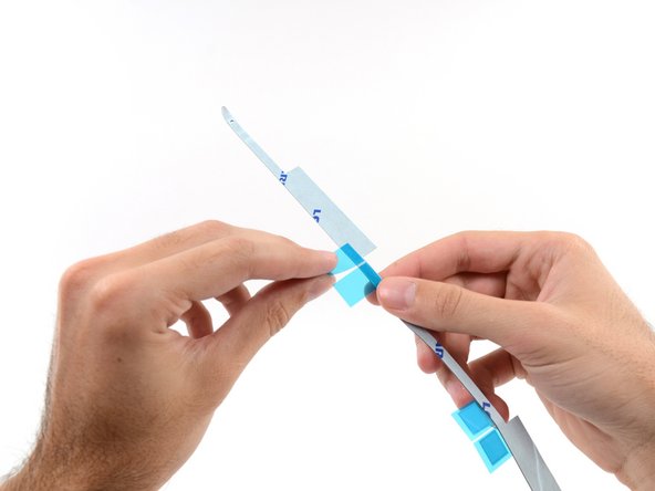 iMac Intel 27" Retina 5K Display 2019 Adhesive Strips Replacement, Install the right side adhesive: crwdns2935265:05crwdnd2935265:02crwdnd2935265:03crwdne2935265:0