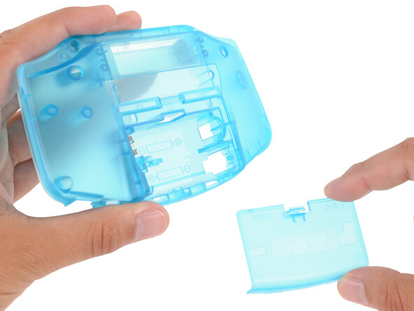 How to Reshell Your Game Boy Advance, Install the back shell: crwdns2935265:033crwdnd2935265:01crwdnd2935265:03crwdne2935265:0