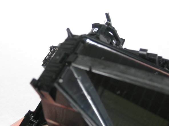 Below is the mirror which is held in by a tab.