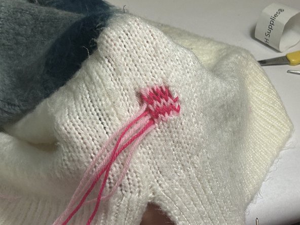 Using Needlework and Crochet to Patch a Hole in Knitwear: step 9, image 3 of 3