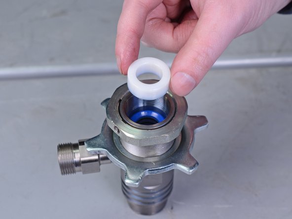 Replace this plastic gland with the new plastic gland included in the pump repair kit.