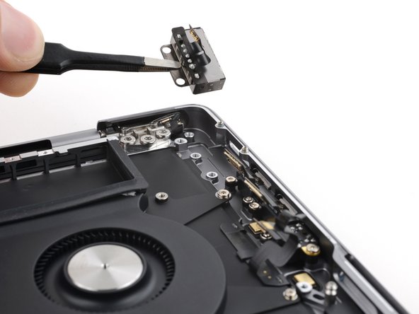 MacBook Pro 14" Late 2023 (M3) MagSafe Port Replacement, Remove the MagSafe port: crwdns2935265:054crwdnd2935265:03crwdnd2935265:03crwdne2935265:0