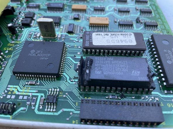 Fluke Hydra 2620A 2025A ERROR 6 caused by dead potted RTC battery - Replacement, Make slots 1/8" from each end of chip: step 4, image 1 of 2