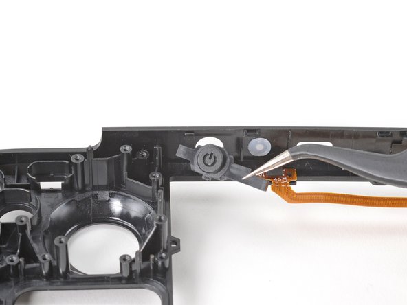 Steam Deck Front Shell Replacement, Remove the power button: crwdns2935265:0100crwdnd2935265:03crwdnd2935265:03crwdne2935265:0