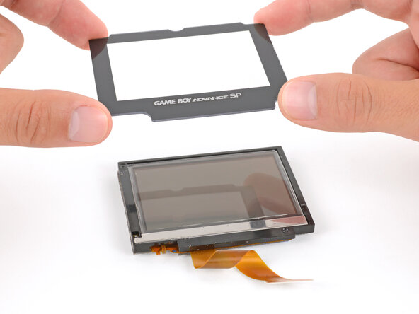 Nintendo Game Boy Advance SP Screen Lens Replacement, Install the new lens: crwdns2935265:032crwdnd2935265:02crwdnd2935265:03crwdne2935265:0