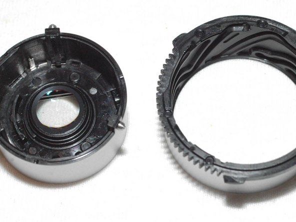 Repairing Casio Exilim EX-Z350 Lens mechanics, Disassemble lens (6): crwdns2935265:017crwdnd2935265:02crwdnd2935265:03crwdne2935265:0
