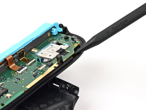 Joy-Con 2 (Left) Joystick Replacement, Lift the board: crwdns2935265:027crwdnd2935265:02crwdnd2935265:03crwdne2935265:0