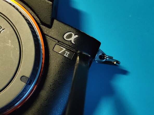 Sony A7 II Top Flex Cable replacement, Removing the top assembly 1 - finally: crwdns2935265:026crwdnd2935265:03crwdnd2935265:03crwdne2935265:0