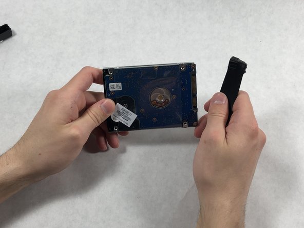 HP Pavilion g7-2023cl Hard Drive Mounting Bracket Replacement: crwdns2935265:010crwdnd2935265:02crwdnd2935265:02crwdne2935265:0