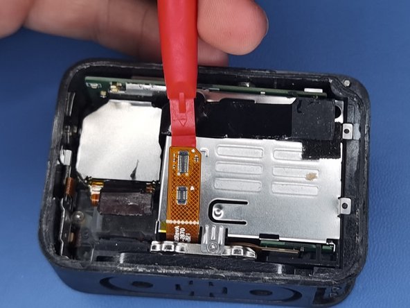 GoPro Hero 9 and 10 Black Disassembly, Removing rear screen - part 2: crwdns2935265:03crwdnd2935265:03crwdnd2935265:03crwdne2935265:0