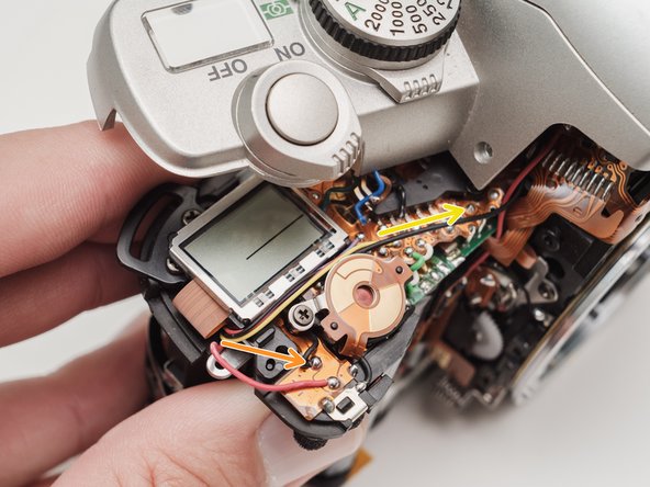 Pentax ZX-5n Exposure Compensation Dial Replacement, Release top cover: step 9, image 2 of 2