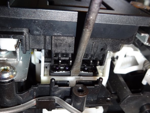 How to Unclog Brother Inkjet Print head Nozzles, Releasing the print head from the carriage: crwdns2935265:011crwdnd2935265:02crwdnd2935265:03crwdne2935265:0