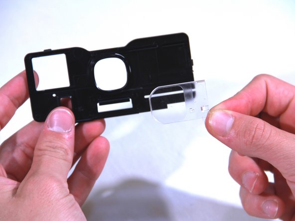 Polaroid Onestep Close Up Close Up Lens Replacement, Removing the Second Part of the Close Up Lens: crwdns2935265:08crwdnd2935265:02crwdnd2935265:02crwdne2935265:0