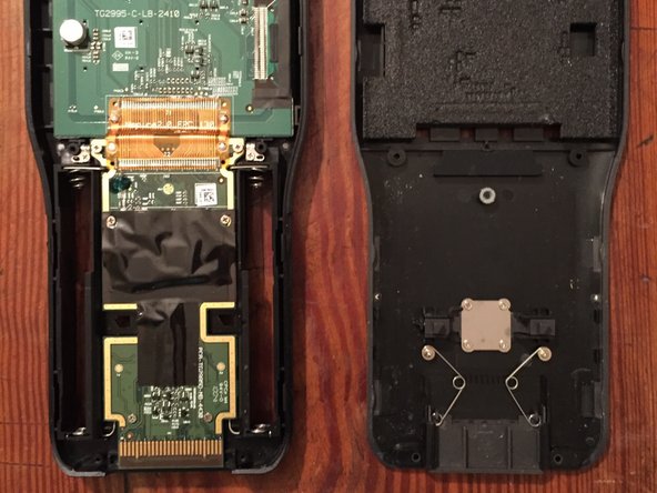 TI-Nspire CAS Teardown, Taking the Screen and Mother Board Out: step 4, image 1 of 3