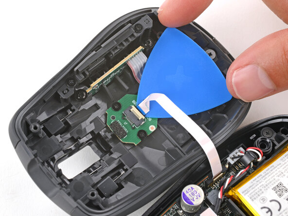 How to Open Your Logitech MX Anywhere 3, Separate the cable adhesive: crwdns2935265:08crwdnd2935265:02crwdnd2935265:02crwdne2935265:0
