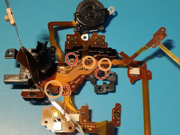 Sony A7 II Top Flex Cable replacement, Inserting it back into the plastic frame: crwdns2935265:035crwdnd2935265:02crwdnd2935265:03crwdne2935265:0