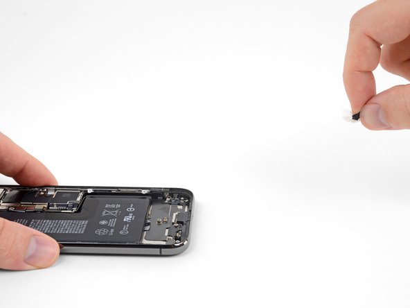 Repeat the previous step to remove the strip on the opposite side, leaving the center strip for last.