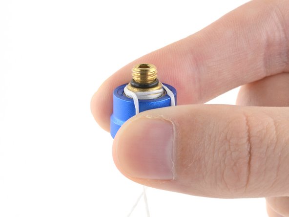 How to Reattach the Cap on a 4 mm iFixit Precision Bit Driver, Arrange and hold the ends of the floss: crwdns2935265:04crwdnd2935265:03crwdnd2935265:03crwdne2935265:0