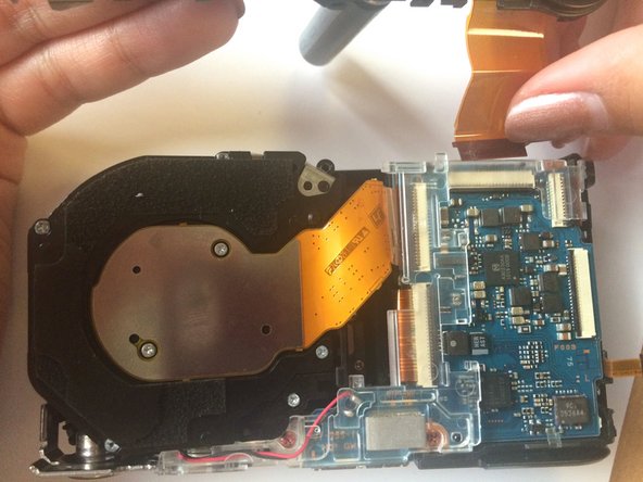 Cyber-shot DSC-H55 Lens Replacement, Removing Top Shell: crwdns2935265:09crwdnd2935265:03crwdnd2935265:03crwdne2935265:0