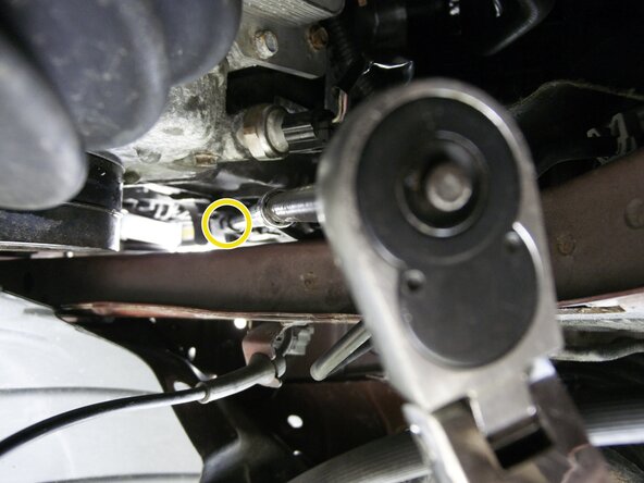 2013-Present Nissan Rogue Cam shaft control solenoid Replacement, Removing the Exhaust valve timing control solenoid valve retaining Bolt: crwdns2935265:02crwdnd2935265:02crwdnd2935265:03crwdne2935265:0