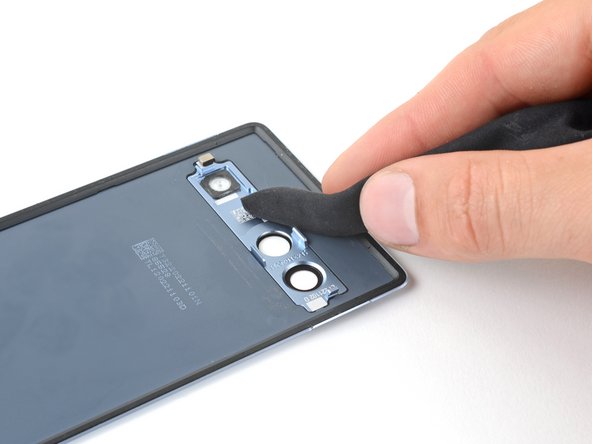 How to Apply Rear Cover Adhesive in Your Google Pixel 7a, Clean the frame and rear cover: crwdns2935265:03crwdnd2935265:03crwdnd2935265:03crwdne2935265:0
