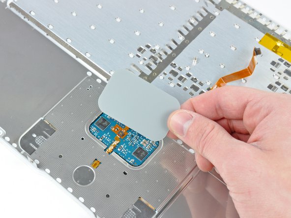 MacBook Core 2 Duo Upper Case Cable Replacement: crwdns2935265:014crwdnd2935265:02crwdnd2935265:02crwdne2935265:0