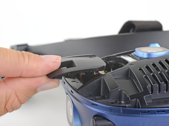 HTC Vive Cosmos Motherboard Replacement, Remove the camera connector covers: crwdns2935265:013crwdnd2935265:03crwdnd2935265:03crwdne2935265:0