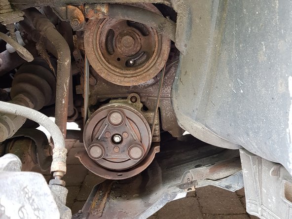 How to fix problem with 2010 Mazda 5 (3) air conditioner magnetic clutch, Getting access to the magnetic clutch: step 5, image 2 of 3